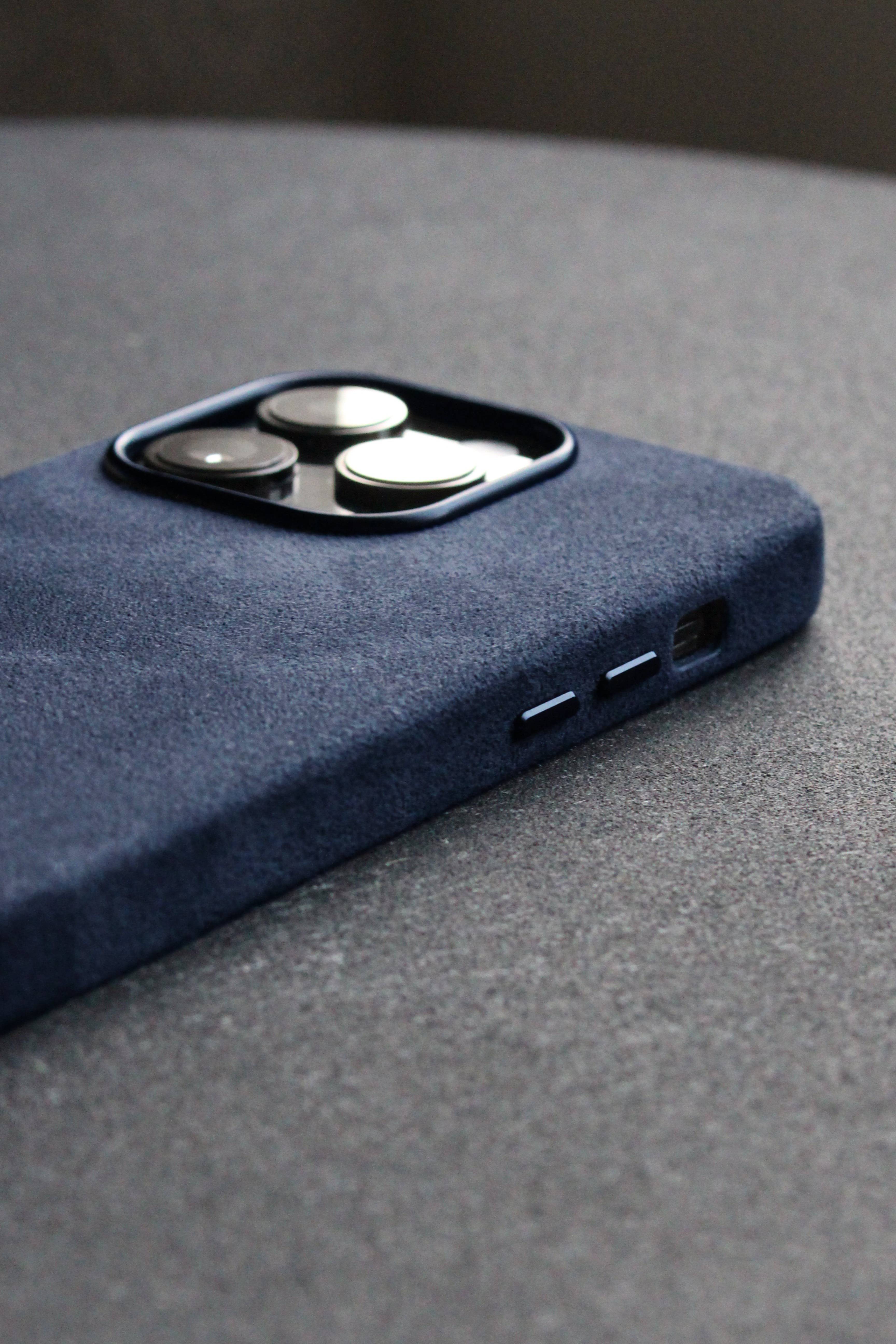 Blue phone case on a gray background