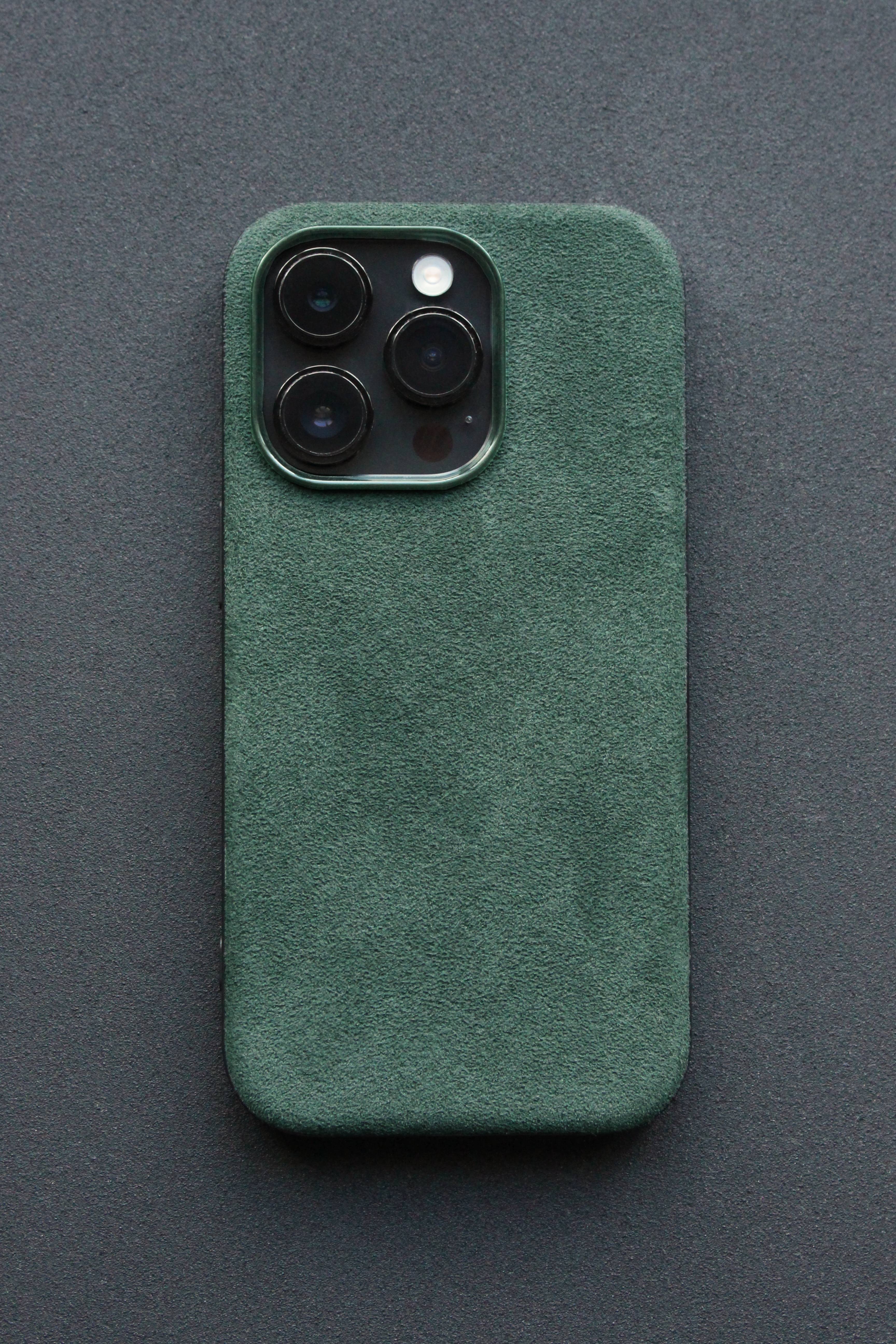 Green phone case on a dark gray background