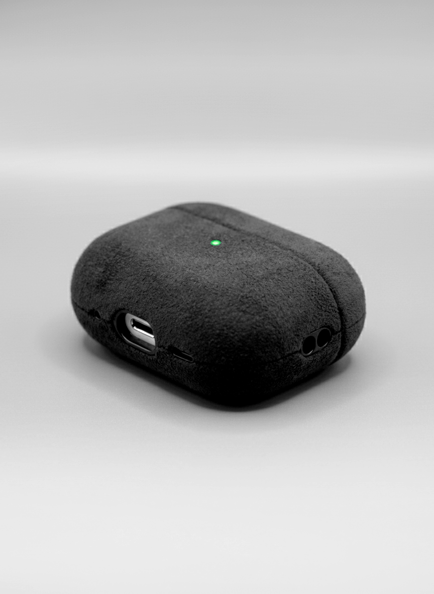 Dark gray Alcantara AirPods case by CORZA PODS